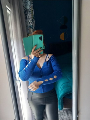 Electric blue knitted blouse with cut-outs and V neckline like new