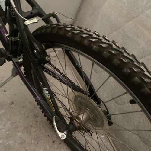 B’Twin Mountain Bike 26” like new, black, front suspension, Shimano gears