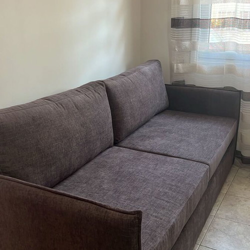 Two-seater sofa bed like new