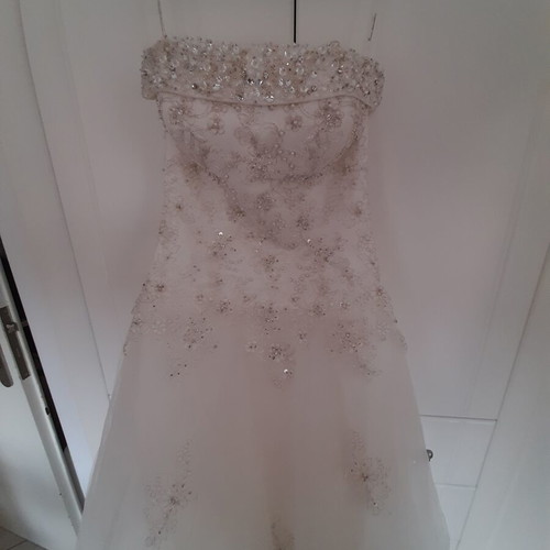 Wedding dress ivory used, strapless with thin extra straps, size small