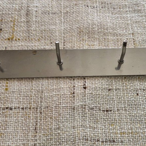 Metal hanger with 6 hooks used