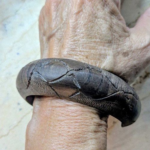 Wooden handmade bangle bracelet with elephants