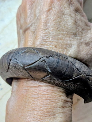 Wooden handmade bangle bracelet with elephants