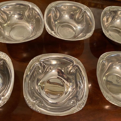 Set of 5 metal small plates and 6 matching stainless steel bowls used