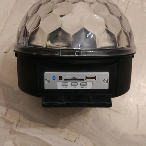 Party light used with Bluetooth, USB port, and built-in speaker