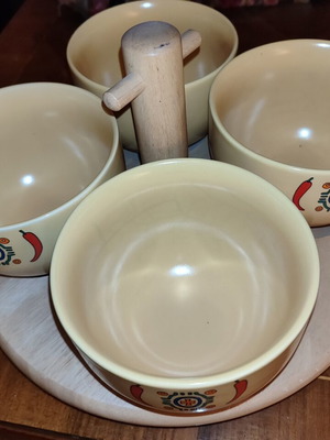 Sagaform rotating serving tray with 4 yellow bowls