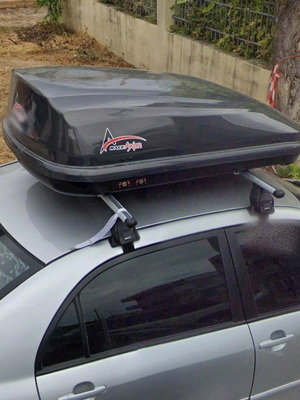 Real Axion roof box with Menabo bars used