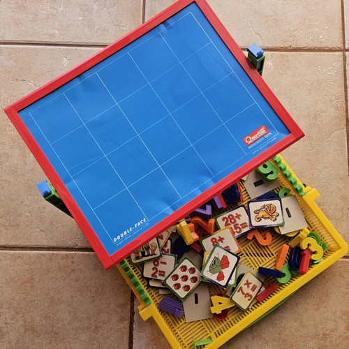 Magnetic board with numbers and math magnets