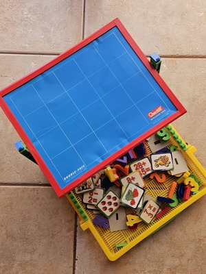 Magnetic board with numbers and math magnets