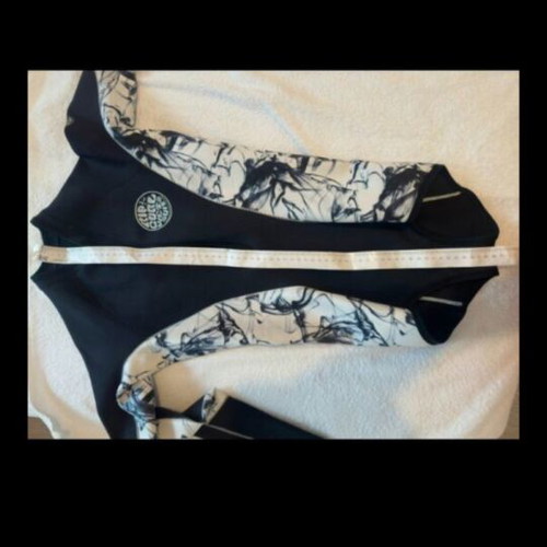 Neoprene swimsuit like new, size xsmall, for cold water sports