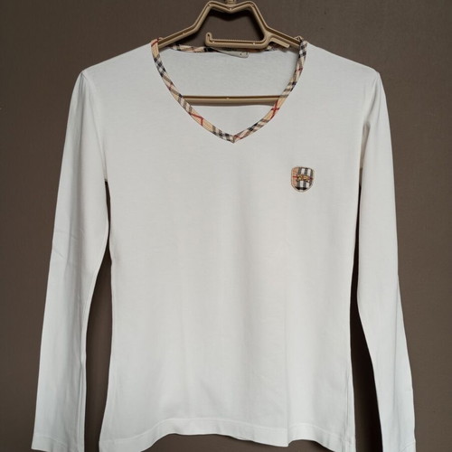 White women's long-sleeve blouse with classic checkered trim, like new