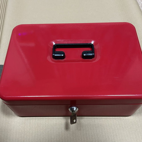 Red metal cash box with lock and key