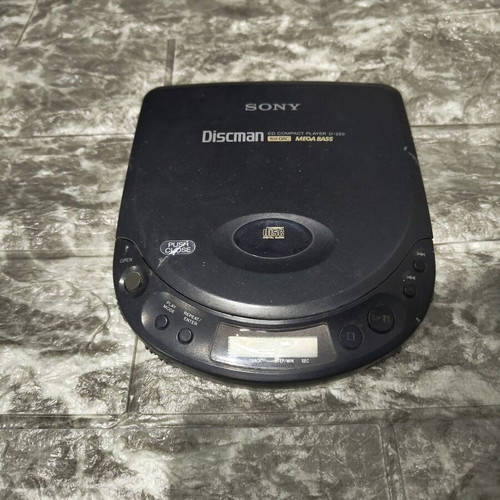 Sony CD Diskman D-220 used, powers on but does not read CDs
