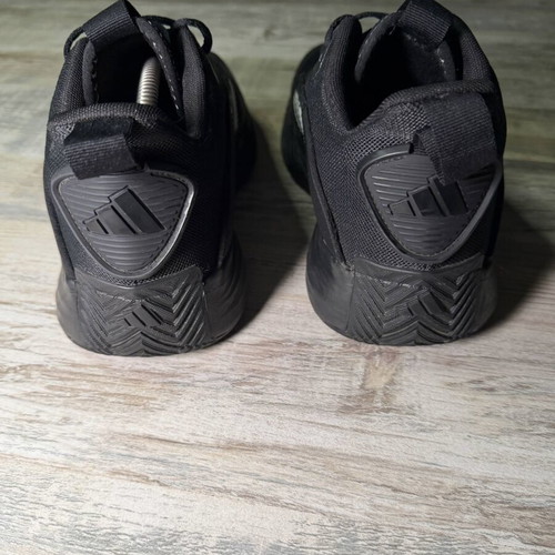 Adidas athletic shoes black mesh with white three stripes, men's size 10 US