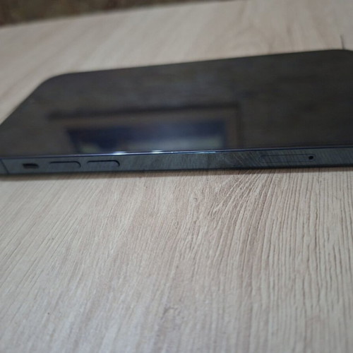 iPhone 12 Pro smartphone with 80% battery health, case included