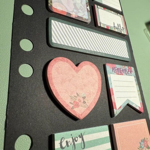 Stationery set with notebook, pen, highlighters, clips, and post-it notes