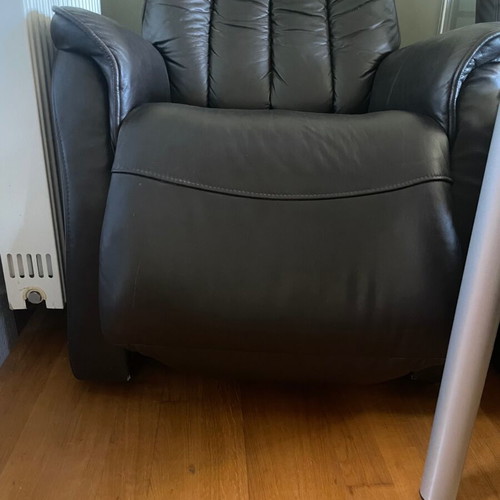 Armchair used, leather with relax function