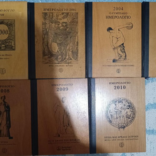 Collectible calendars like new with wooden cover