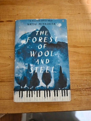 The Forest of Wool and Steel used hardcover with moisture damage