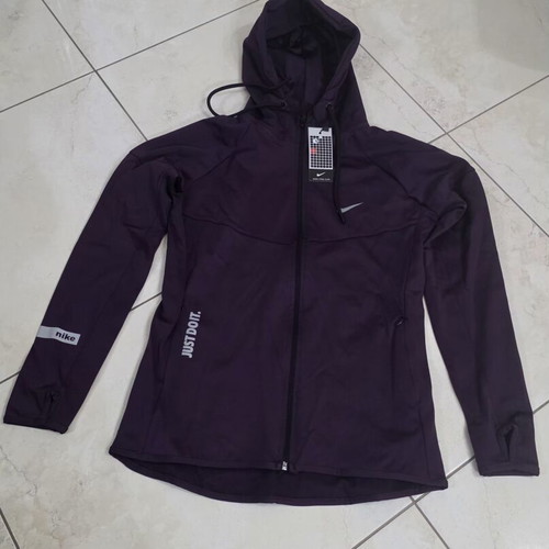 Nike women's purple sports jacket size M