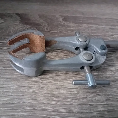 Old laboratory tools used for holding test tubes and bottles
