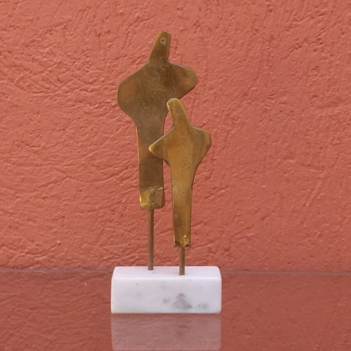 Brass sculpture used on marble base