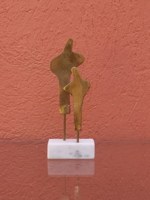 Brass sculpture used on marble base