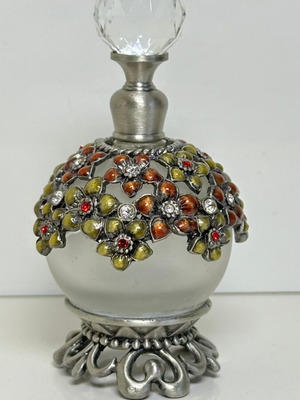 Vintage glass perfume bottle with floral enamel decoration