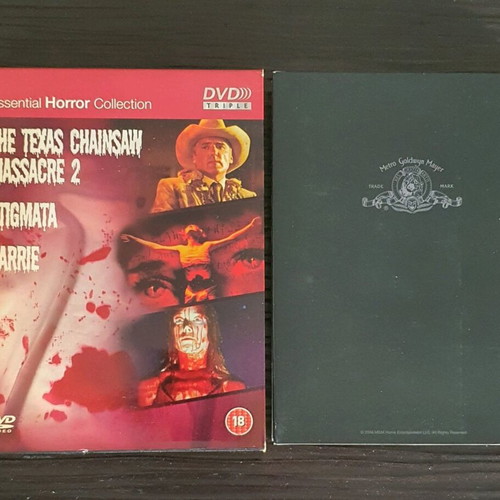 Essential Horror Collection Box Set used DVD with The Texas Chainsaw Massacre 2, Stigmata, Carrie