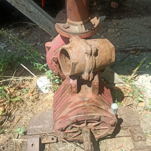 Tractor water pump used with check valve