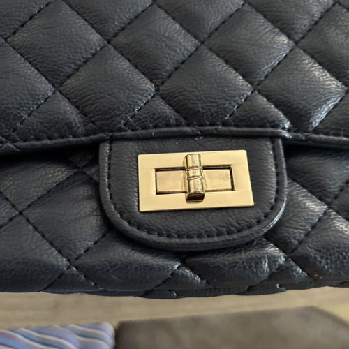 Shoulder bag blue like new with gold details