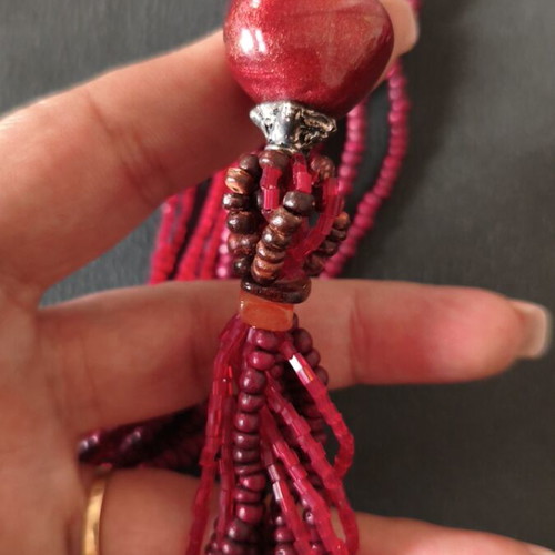 Necklace like new, handmade multistrand with red beads and marble-like stones