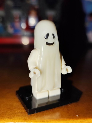 Ghost figure like new with glow-in-the-dark stand Lepin