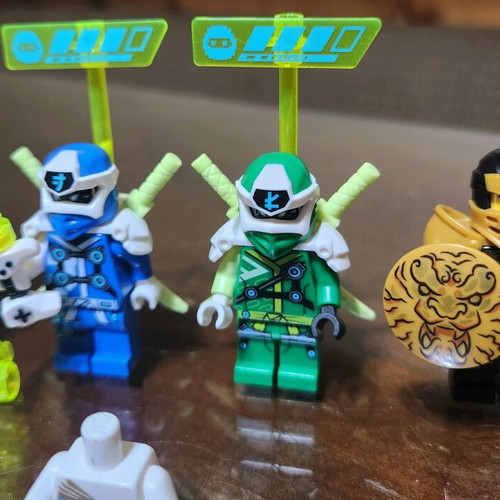 Lego Ninjago figures used with weapons
