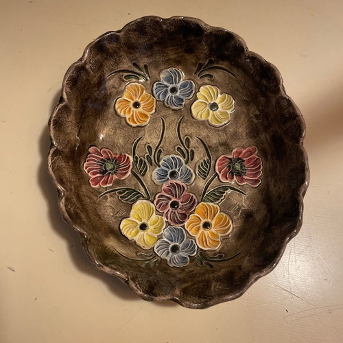 Vintage handmade ceramic bowl with embossed flowers like new