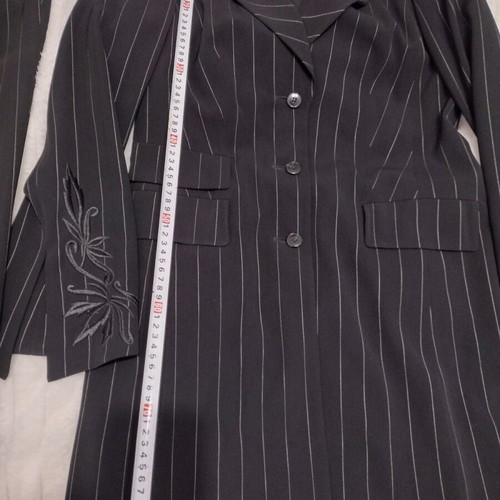 Women's black two-piece suit like new with white pinstripe size M