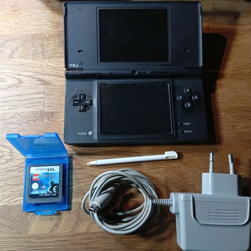 Nintendo DSi black console like new with charger, LEGO Harry Potter, stylus