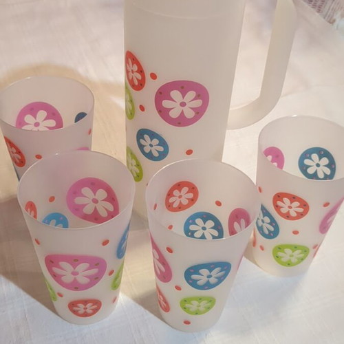 Pitcher set with 4 water glasses used, plastic