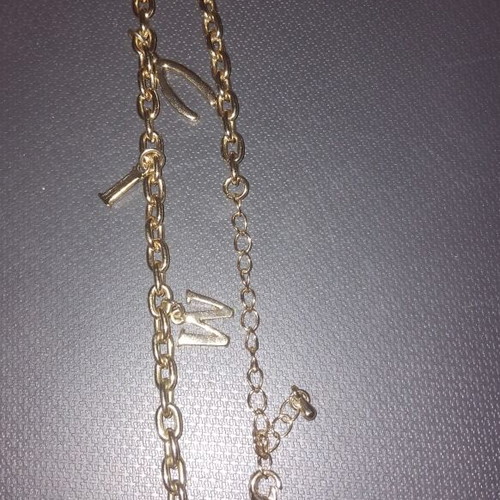 Necklace like new, gold stainless steel with letters