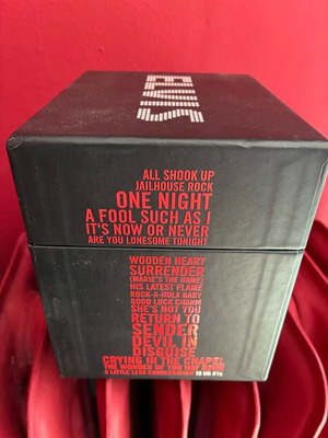 Elvis box like new, collectible with 2-3 singles