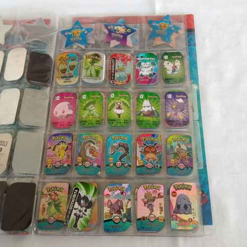 Collectible album with 132 Pokemon metal tags