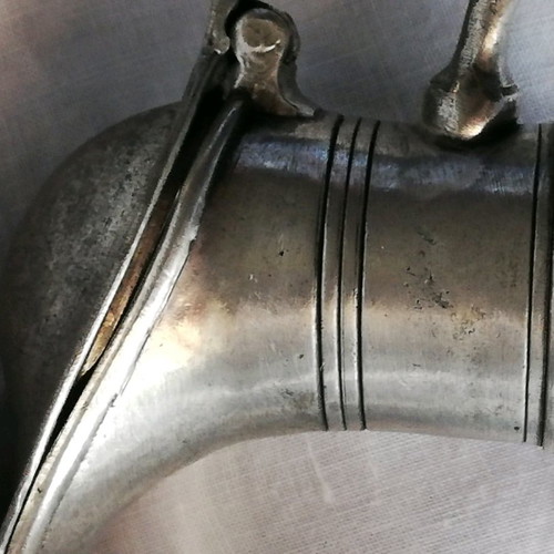 Glass duck-shaped carafe used with pewter spout