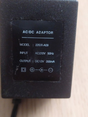 AC/DC adaptor 12v used, model 220/X-A09