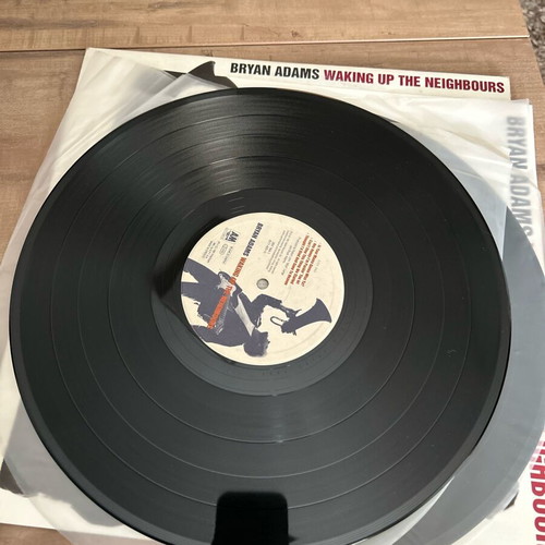 Bryan Adams So Far So Good vinyl used, with poster