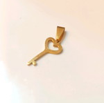 Steel heart key necklace like new, gold color