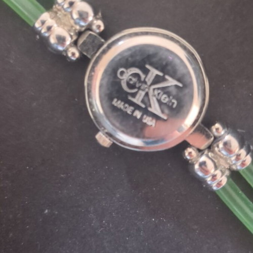 Calvin Klein wristwatch used, green and silver