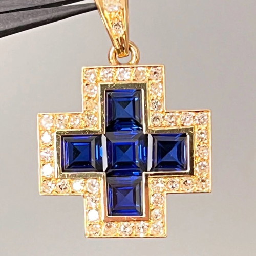 Gold cross k18 like new with diamonds and sapphires