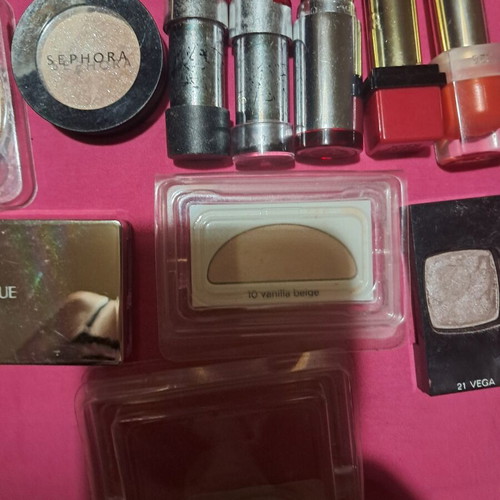 Large collection of branded cosmetics with YSL mirror and makeup bag