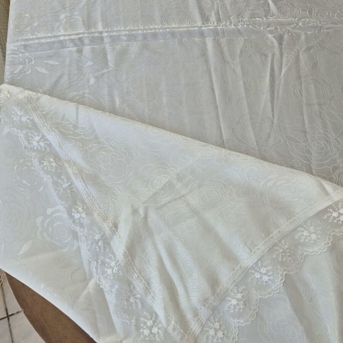 White floral tablecloth with delicate lace edges like new
