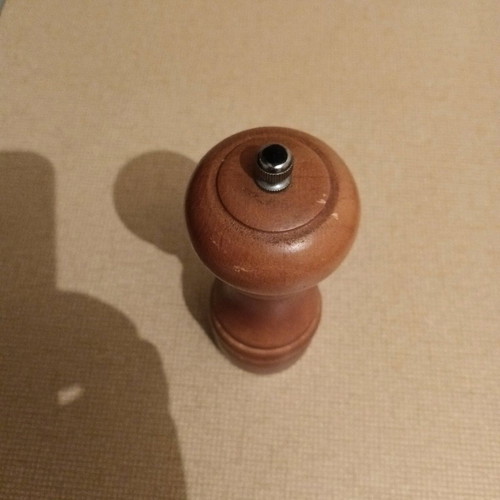 Wooden pepper mill used with steel mechanism